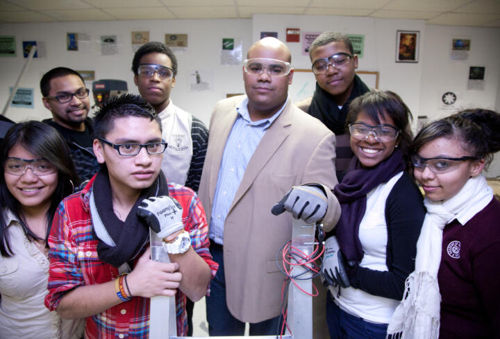 Adult with teens wearing goggles